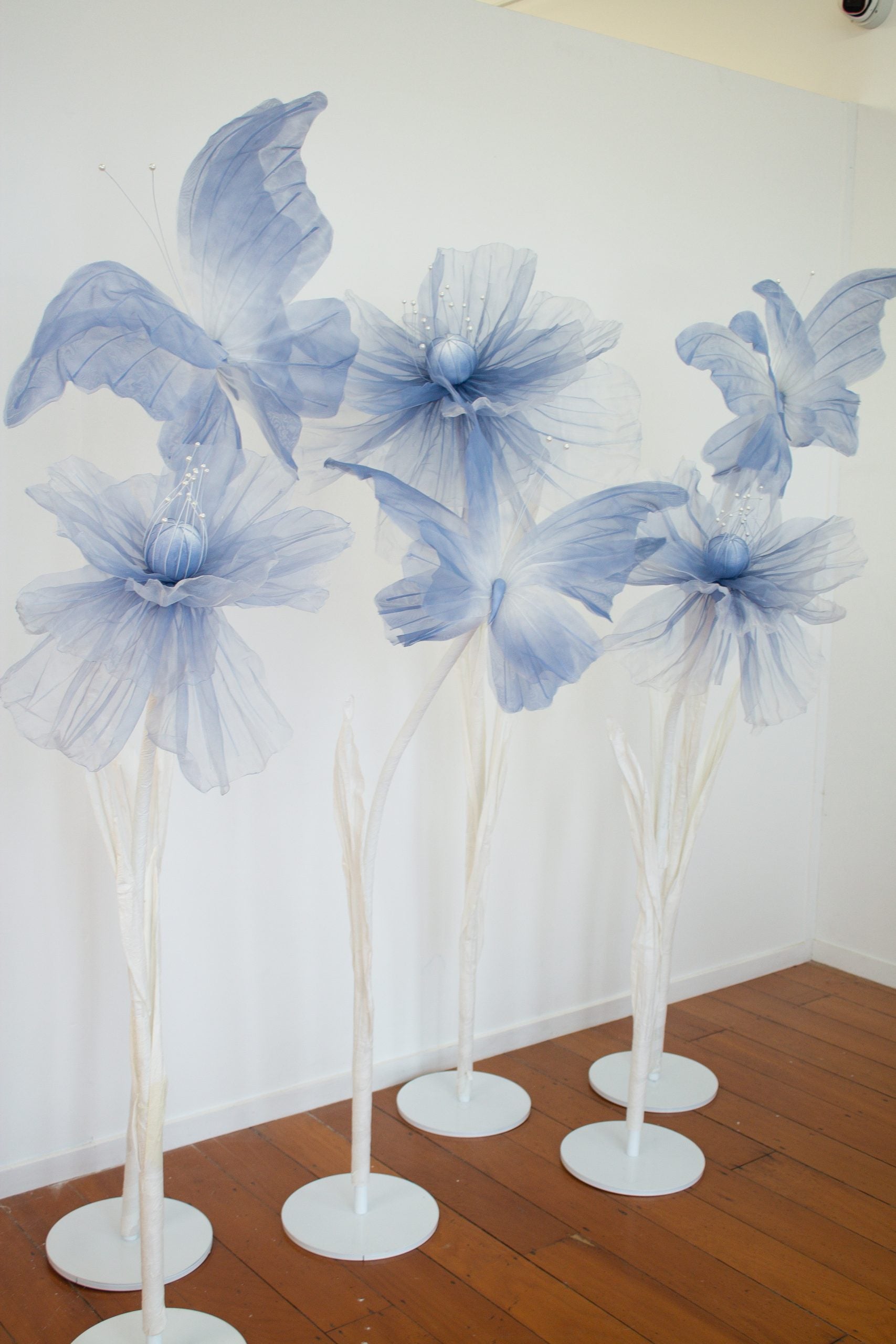 giant flowers, giant silk flowers, giant blue flowers, giant poppy flowers, blue flowers, flower props, flower backdrop, giant flower hire auckand, giant flower hire